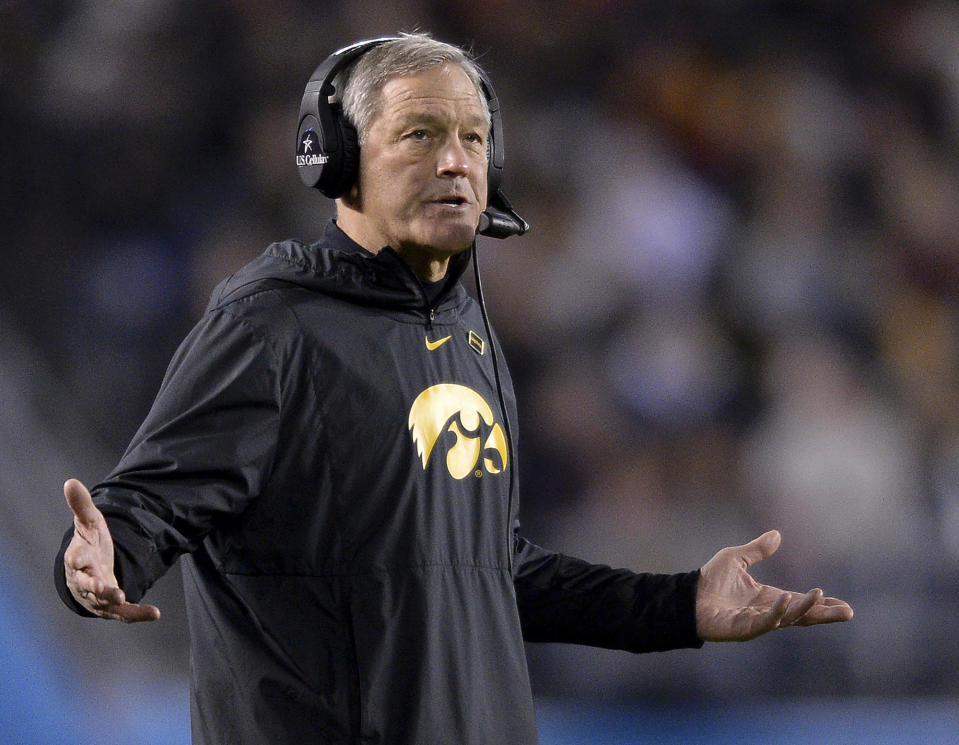 FILE - In this Dec. 27, 2019, file photo, Iowa head coach Kirk Ferentz reacts during the second half of the Holiday Bowl NCAA college football game against Southern California. The University of Iowa said it would not pay a demand from eight Black former football players for $20 million in compensation for alleged racial discrimination they faced while they played for the Hawkeyes. The players also called for the firings of Kirk Ferentz, offensive line coach Brian Ferentz and athletic director Gary Barta. (AP Photo/Orlando Ramirez, File)