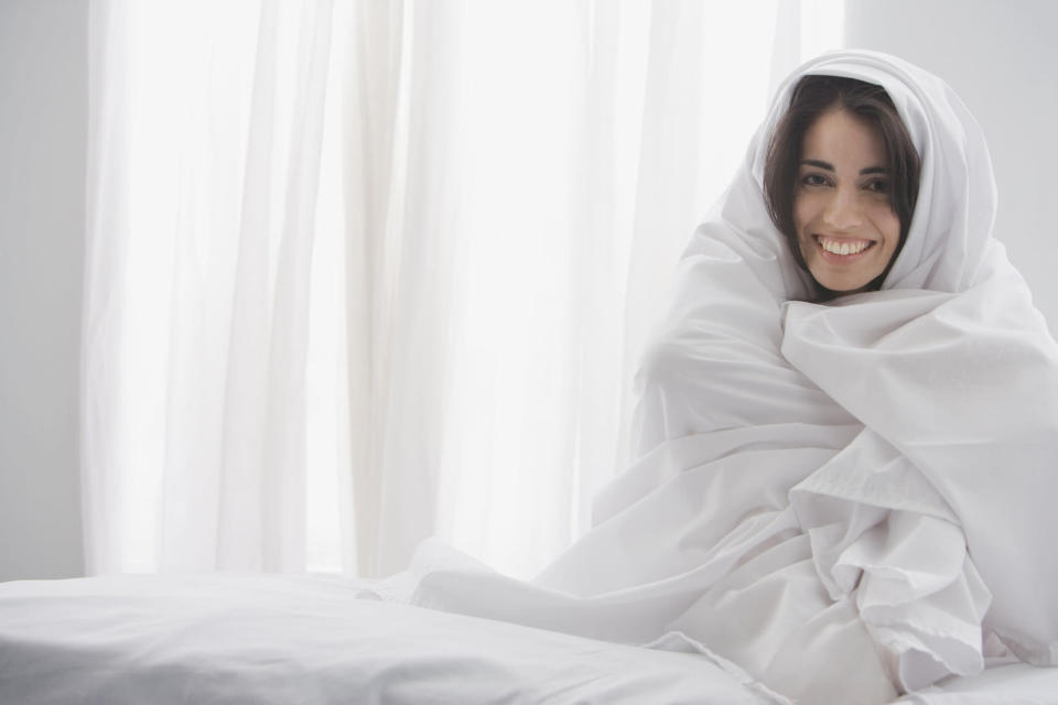 Would you give adult swaddling a go? [Photo: Getty]