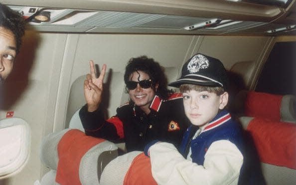 Michael Jackson and 10-year-old James Safechuck aboard Jackson's tour plane in 1988 - Dave Hogan