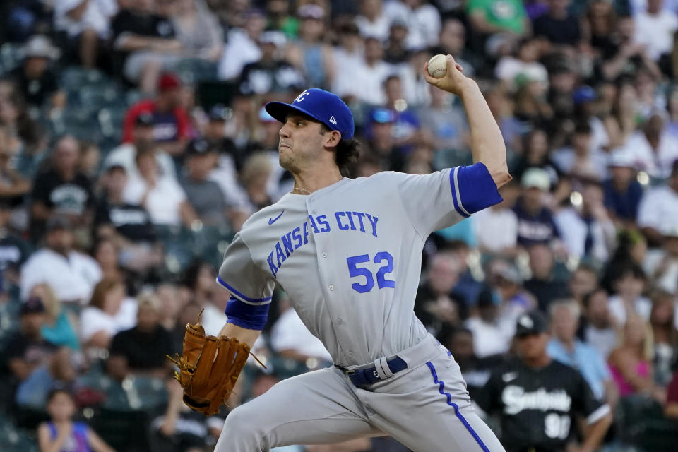 Kansas City Royals starting pitcher Daniel Lynch delivers during the first inning of a baseball game against the Chicago White Sox Monday, Aug. 1, 2022, in Chicago. (AP Photo/Charles Rex Arbogast)