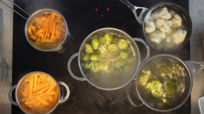 Vegetables boiling on a stove