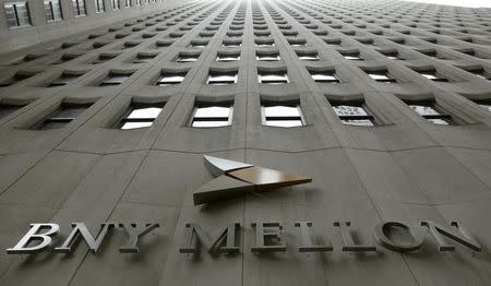 A BNY Mellon sign is seen on their headquarters in New York's financial district, in this January 19, 2011 file photo. REUTERS/Brendan McDermid