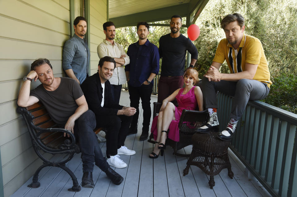 In this Tuesday, Aug. 27, 2019 photo, Andy Muschietti, far right, director of "It Chapter Two," poses for a portrait with cast members, from left, James McAvoy, Jay Ryan, Bill Hader, James Ransone, Andy Bean, Isaiah Mustafa and Jessica Chastain at Heritage Square Museum, in Los Angeles. (Photo by Chris Pizzello/Invision/AP)