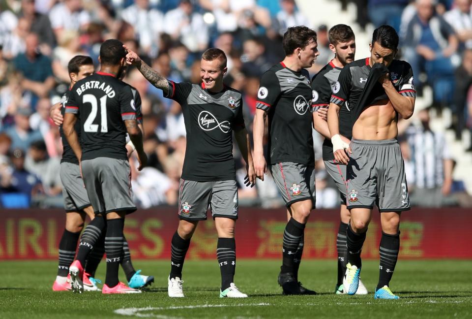 <p>Jordy Clasie celebrates his opening goal for Saints</p>