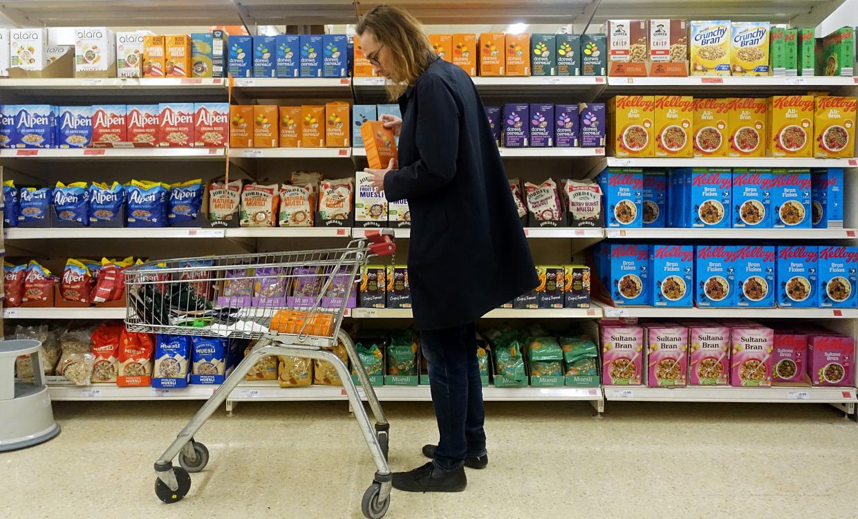 A man shops at a supermarket in London, Britain, April 8, 2022.