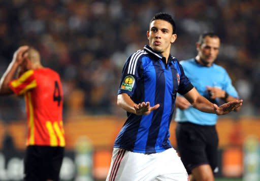 Egypt's al-Ahly forward Nagi Ismail celebrates after scoring a goal against Esperance de Tunis during their CAF Confederation Cup football match at Rades Olympic stadium near Tunis. Al Ahly of Egypt won their seventh CAF Champions League title after they defeated Esperance 3-2 on aggregate on Saturday in Tunis