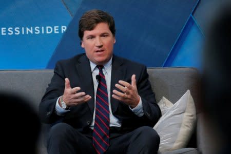 Fox personality Tucker Carlson speaks at the 2017 Business Insider Ignition: Future of Media conference in New York, U.S., November 30, 2017.  REUTERS/Lucas Jackson/File Photo