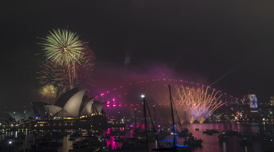 Fireworks explode over the Sydney Harbour during New Year's Eve celebrations in Sydney, Monday, December 31, 2018. 