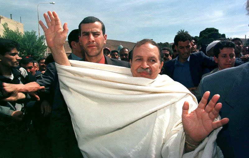 FILE PHOTO: Algerian Presidential candidate Abdelaziz Bouteflika wears a kabil traditionnal burnous during a campaign rally