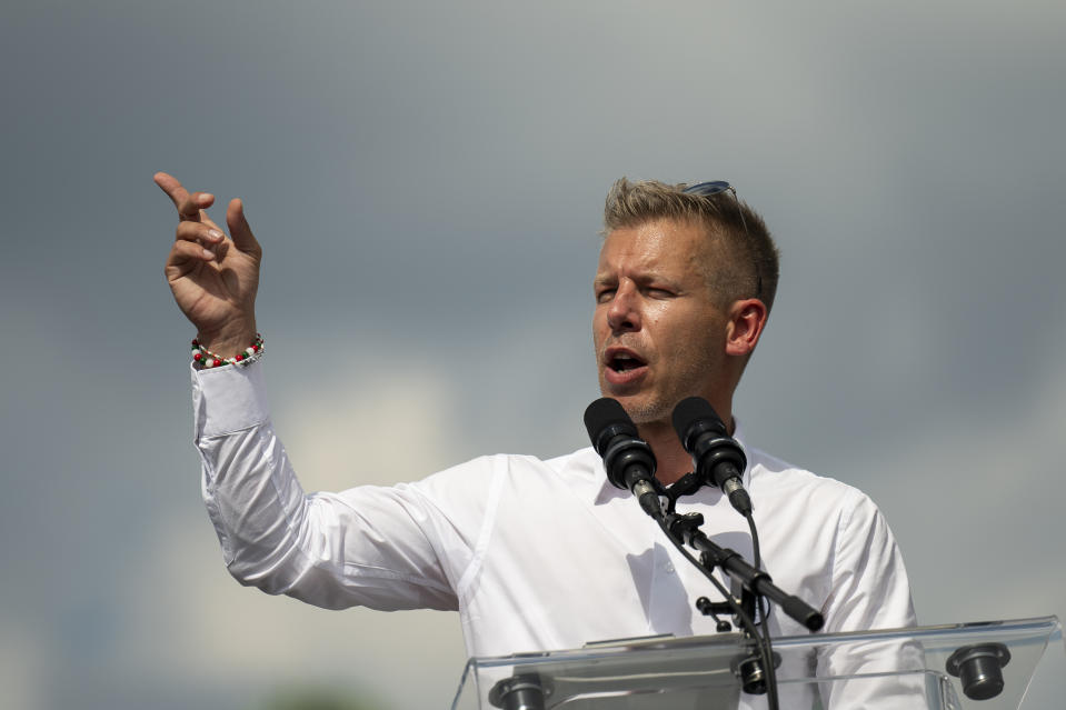 A challenger to Hungarian Prime Minister Viktor Orbán, Péter Magyar, addresses his supporters during a demonstration on the eve of European Parliament elections on Saturday, June 8, 2024. (AP Photo/Denes Erdos)