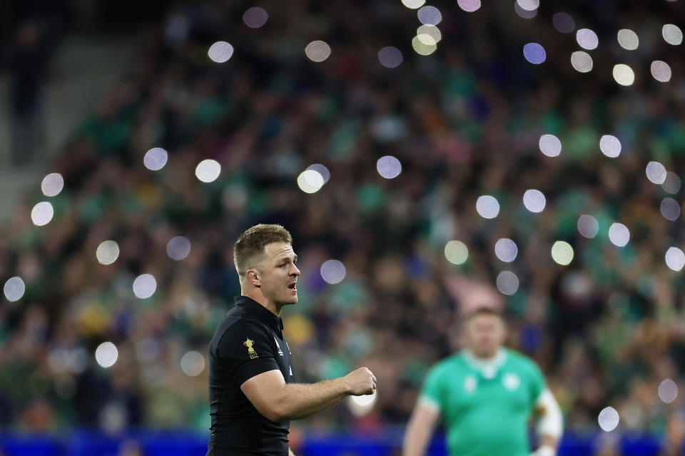 New Zealand's Sam Cane walks on the pitch before the Rugby World Cup quarterfinal match between Ireland and New Zealand at the Stade de France in Saint-Denis, near Paris, Saturday, Oct. 14, 2023. (AP Photo/Aurelien Morissard)
