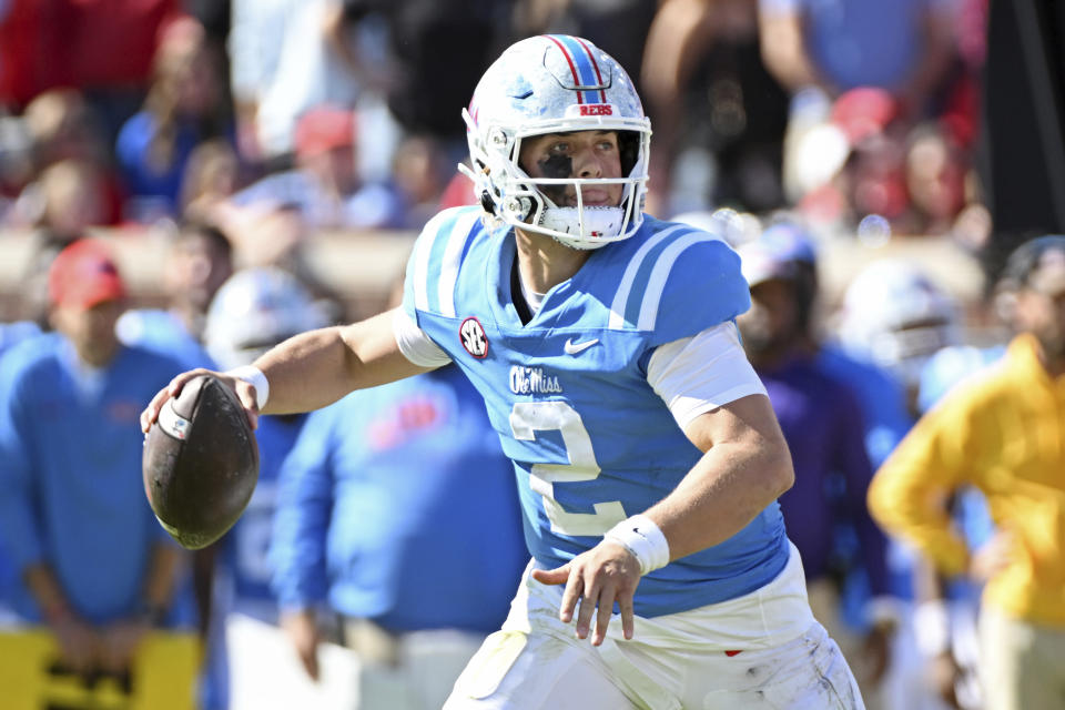 Mississippi quarterback Jaxson Dart (2) looks to pass during the second half of an NCAA college football game against Texas A&M in Oxford, Miss., Saturday, Nov. 4, 2023. Mississippi won 38-35. (AP Photo/Thomas Graning)