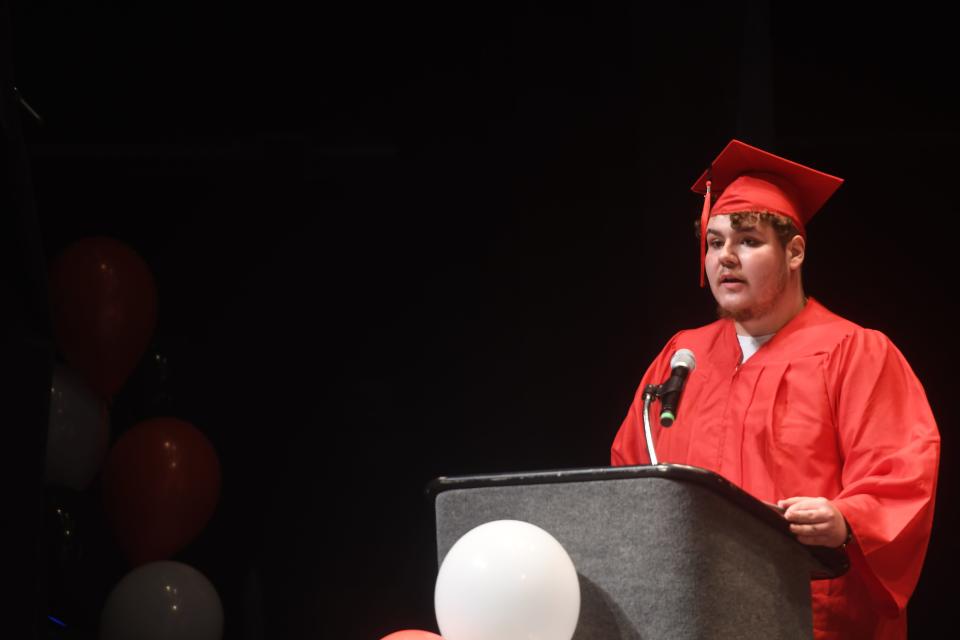 Gabe Duran, a 2023 graduate of D70 Alternative Learning Academy, gives a heartfelt speech during his school's graduation ceremony on Wednesday, May 24, at Memorial Hall.