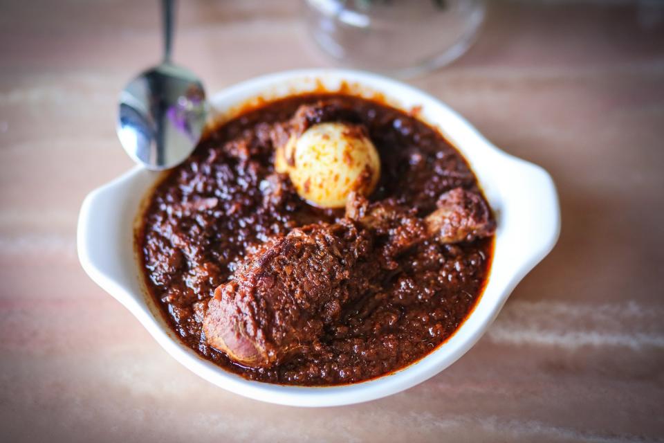 "Doro wot," chicken stewed in robust African chili spices and served with a hard-boiled egg, is the national dish of Ethiopia. It is served at Queen of Sheeba, a full-service Ethiopian restaurant situated in West Palm Beach's Northwest Historic District and owned by chef Lojo Washington.