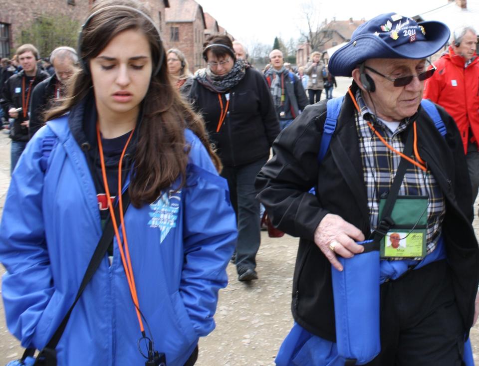 Jori Epstein, left, and Max Glauben tour a Nazi concentration camp in Poland in 2012.