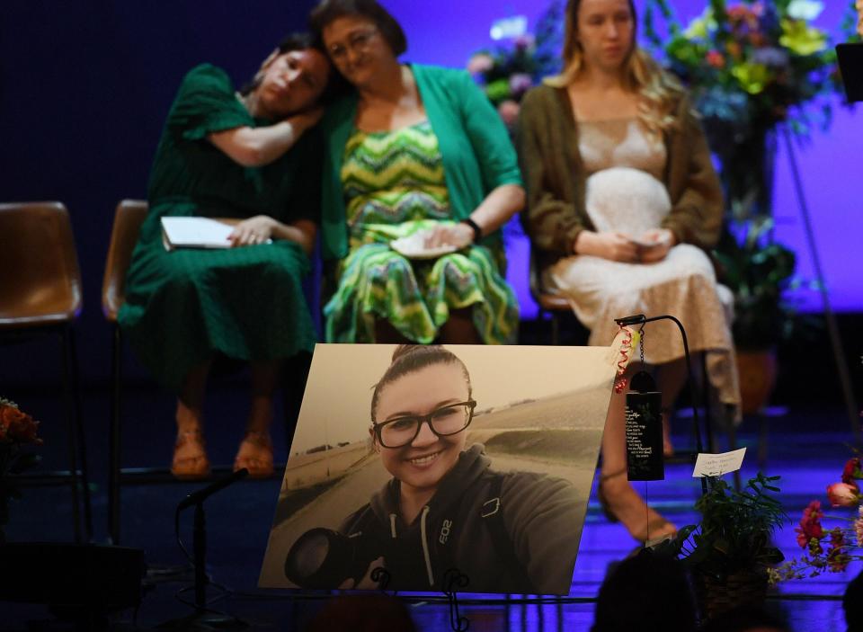 Family and friends console each other at a funeral service for Eden Montang at Cornerstone Church in Ames. Two Iowa State University students, Eden Montang, 22, of Boone, and 21-year-old Vivian Flores of West Des Moines, were shot and killed on June 2 in the church parking lot by Montang's former boyfriend. The Iowa Attorney General's Office classified the deaths as domestic violence.