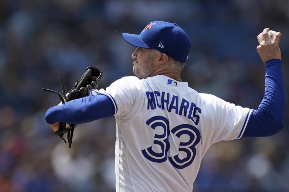 Toronto Blue Jays starting pitcher Trevor Richards (33) throws against the Minnesota Twins during the first inning of a baseball game in Toronto, Saturday, June 10, 2023. (Arlyn McAdorey/The Canadian Press via AP)