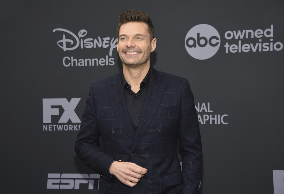 FILE - In this May 14, 2019 file photo, Ryan Seacrest attends the Walt Disney Television 2019 upfront in New York. Most folks have slowed down in the past nine months but Seacrest says he's been juggling more than normal during the pandemic. This week, he will return to New York's Times Square to host “Dick Clark New Year’s Rockin’ Eve.” The broadcast will be closed to the public except for a small group of front line workers. (Photo by Evan Agostini/Invision/AP, File)
