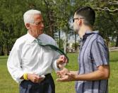 Democratic candidate for Florida governor Charlie Crist talks to Horacio Sierra, Cuban American Democratic Club President during his meeting with Miami-Dade Democratic Cuban Americans Saturday, May 8, 2021 at Tropical Park in Miami