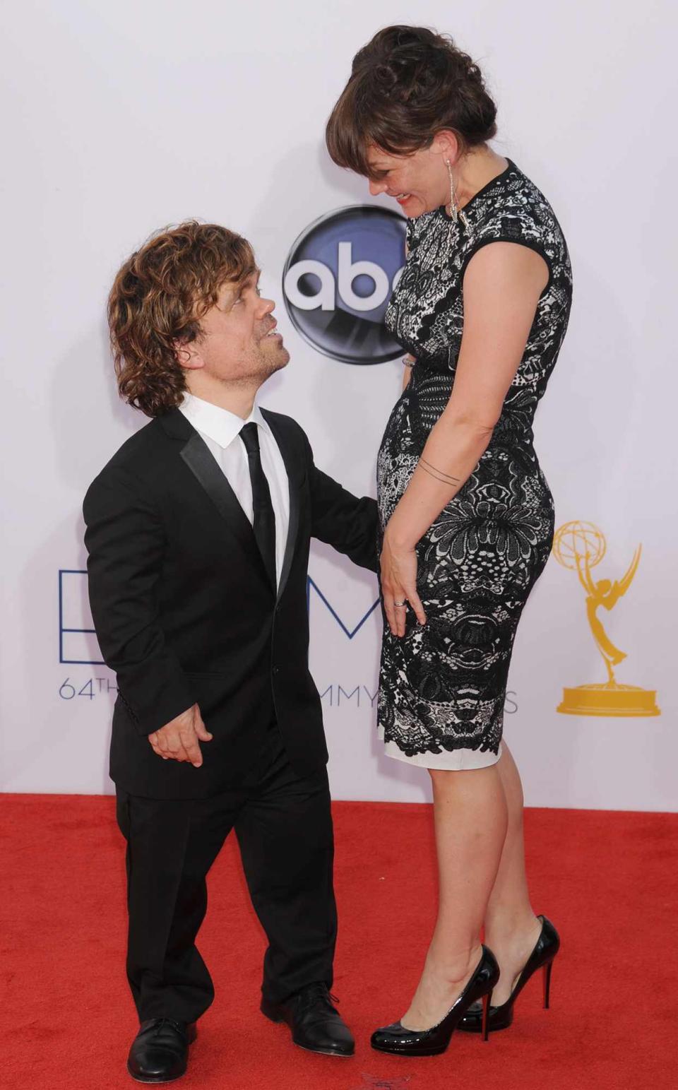 Peter Dinklage and Erica Schmidt arrive at the 64th Primetime Emmy Awards at Nokia Theatre L.A. Live on September 23, 2012 in Los Angeles, California