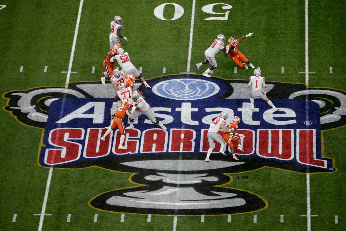 Ohio State quarterback Justin Fields passes against Clemson during the first half of the Sugar Bowl NCAA college football game Friday, Jan. 1, 2021, in New Orleans. (AP Photo/Butch Dill)