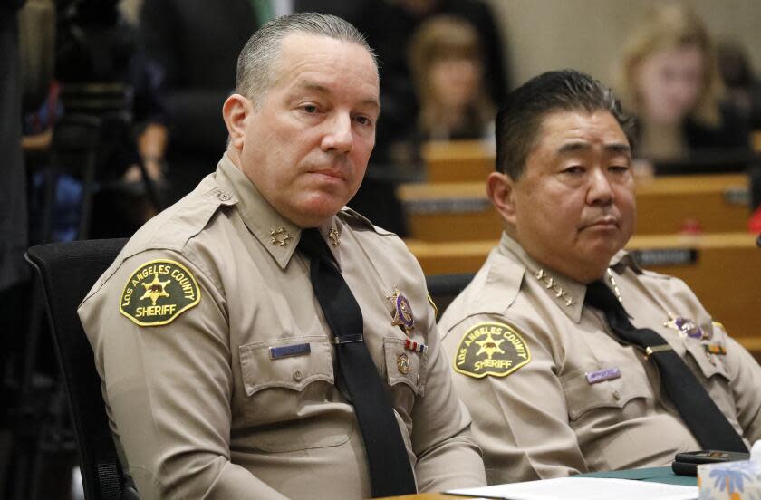 L.A. County Sheriff Alex Villanueva, left, and Undersheriff Tim Murakami at a Board of Supervisors meeting in 2019.