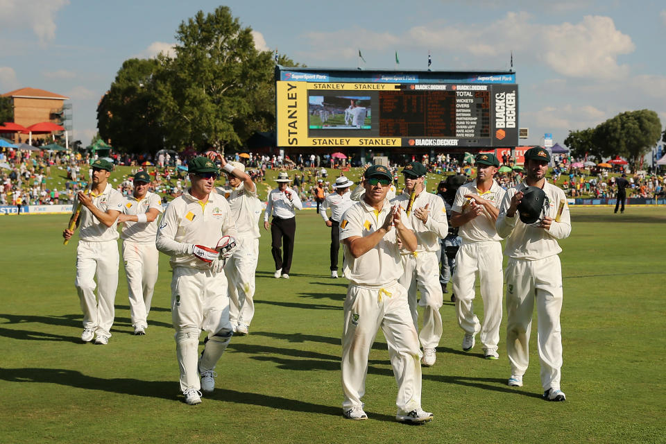 Australian players celebrate after winning the game during day four of the First Test match between South Africa and Australia on February 15, 2014 in Centurion, South Africa. (Photo by Morne de Klerk/Getty Images)