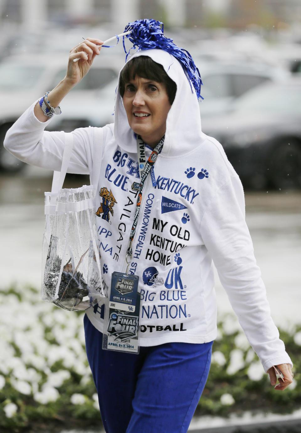 Jane Fletcher of Litchfield, Kentucky arrives for NCAA Final Four tournament college basketball semifinal games Saturday, April 5, 2014, in Dallas. (AP Photo/Charlie Neibergall)