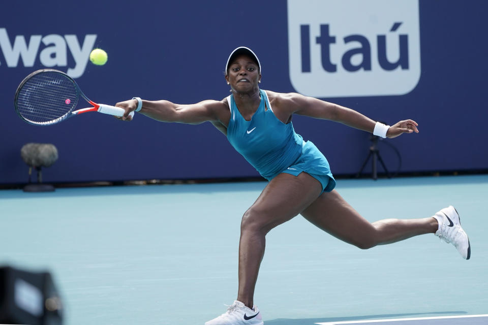 Sloane Stephens returns a shot from Jessica Pegula, during the Miami Open tennis tournament, Friday, March 25, 2022, in Miami Gardens, Fla. (AP Photo/Wilfredo Lee)