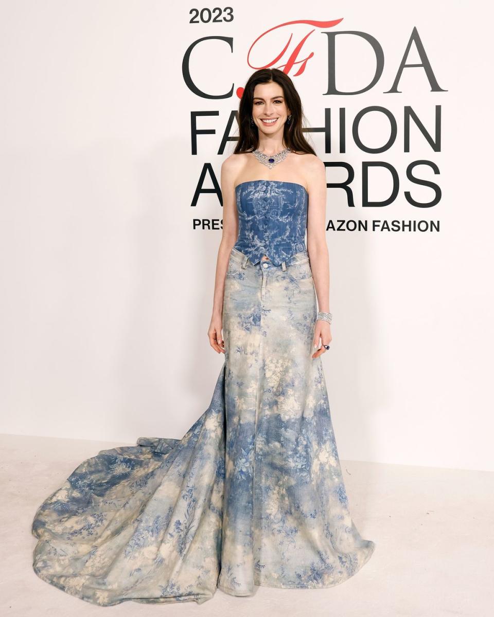 Anne Hathaway’s denim corset and maxi skirt is giving Britney Spears