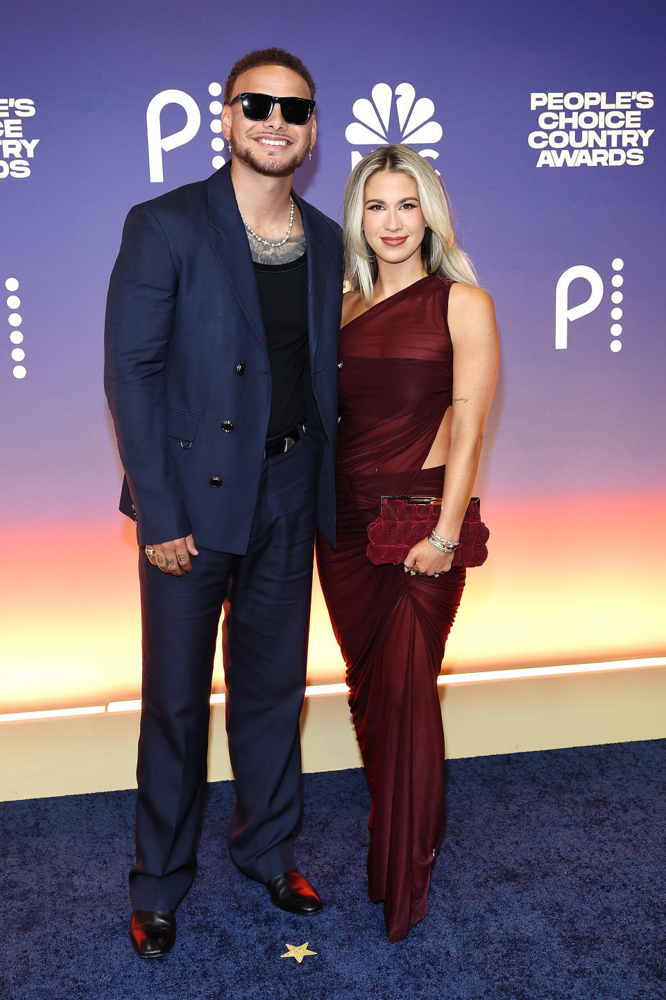 Kane and Katelyn Jae Brown wear dress shoes at the 2024 People's Choice Country Awards in Nashville