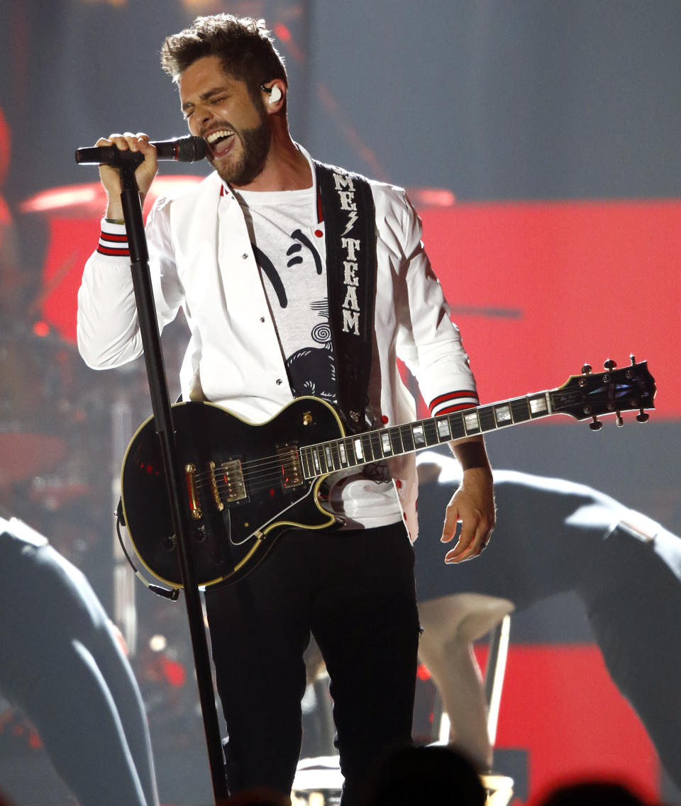 <p>Thomas Rhett performs “Craving You” at the CMT Music Awards at Music City Center on Wednesday, June 7, 2017, in Nashville, Tenn. (Photo by Wade Payne/Invision/AP) </p>