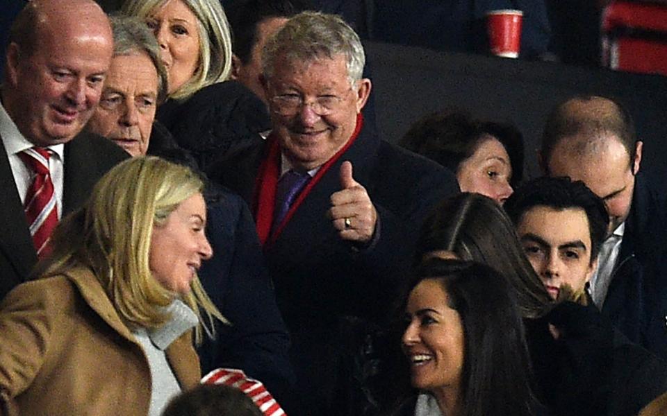 Former United manager Alex Ferguson gestures in the crowd, a day short of his 80th birthday at half time in the English Premier League football match between Manchester United and Burnley  -  OLI SCARFF/AFP via Getty Images