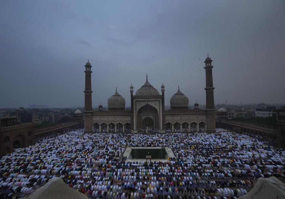 FILE - Muslims offer Eid al-Adha prayers at the Jama Masjid or Mosque, in New Delhi, India, Thursday, June 29, 2023. The nones in India come from an array of belief backgrounds, including Hindu, Muslim and Sikh. The surge of Hindu nationalism has shrunk the space for the nones over the last decade, activists say. (AP Photo/Manish Swarup, File)