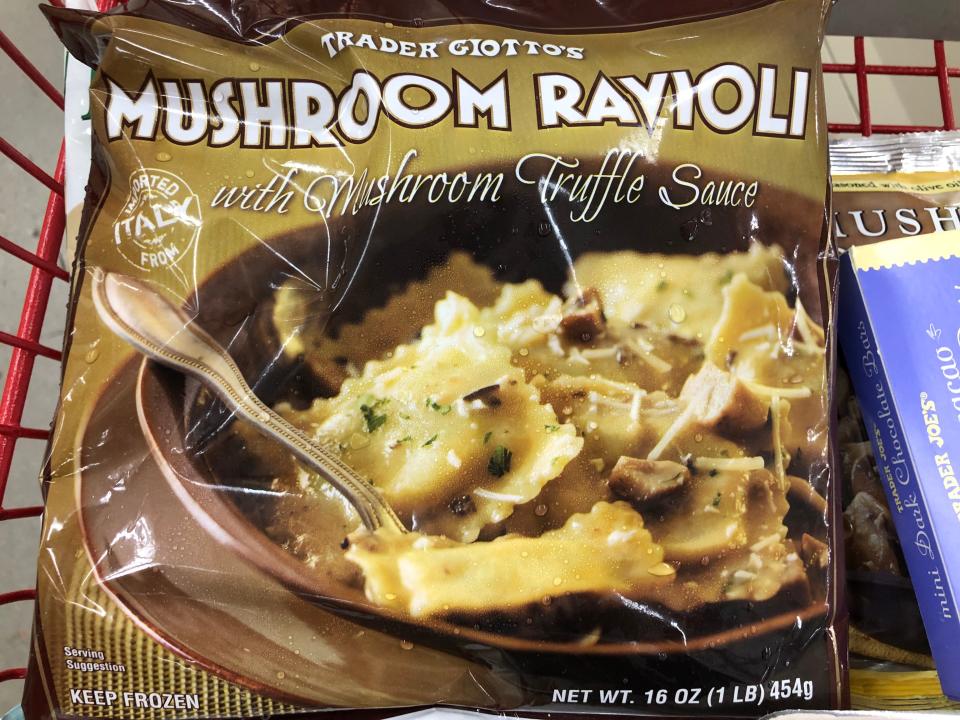 A bag of Trader Joe's mushroom ravioli with mushroom-truffle sauce.