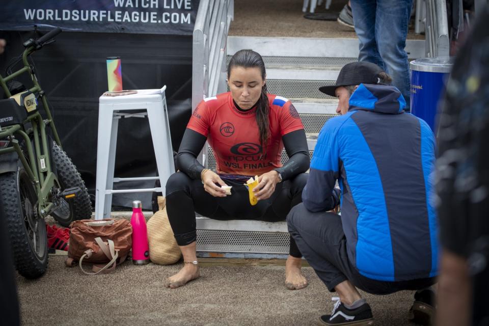 Johanne Defay rests after beating seven-time WSL champion Stephanie Gilmore