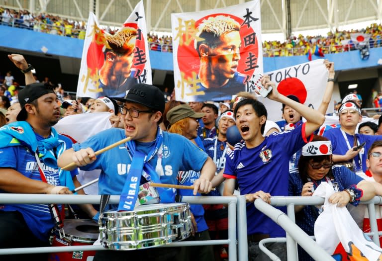 Japan fans celebrate the 2-1 win over Colombia in Saransk