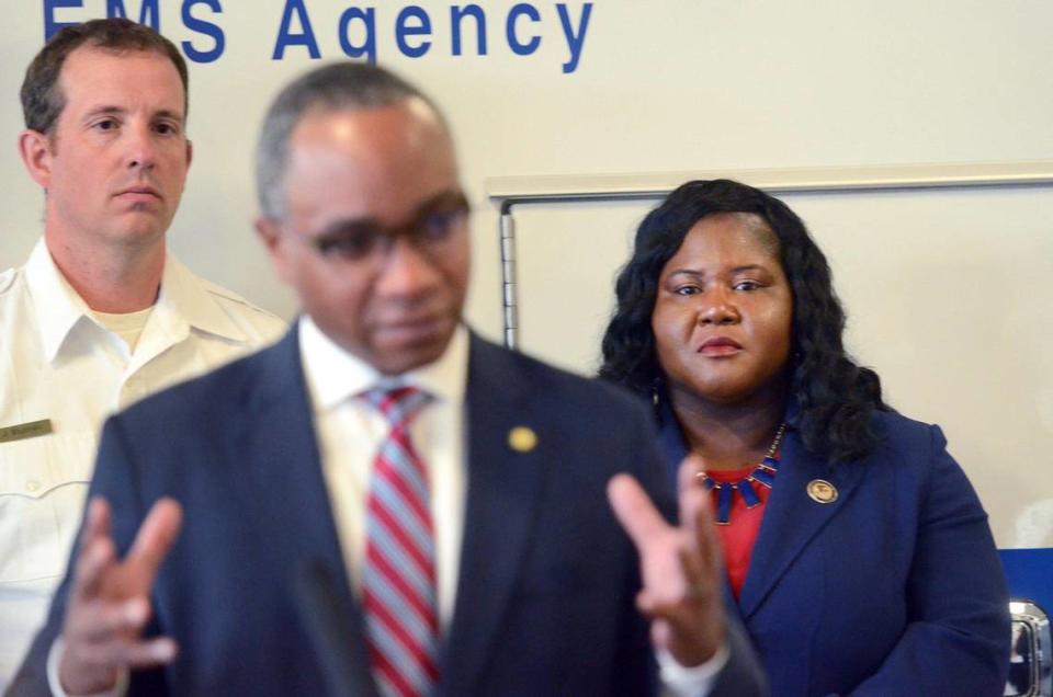 U.S. Attorney for the Western District of North Carolina Dena King, right, listens as District Attorney Spencer Merriweather speaks during a press conference addressing the rising number of fentanyl overdoses in Mecklenburg County on Monday, Aug. 21, 2023 in Charlotte. Leaders from the City of Charlotte, Mecklenburg County, and the Federal Government will came together to raise awareness about the impacts that fentanyl has in our community.