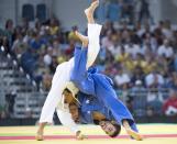<p>Canada’s Antoine Bouchard, right, throws Mongolia’s Davaadorj Tumurkhuleg during their repechage judo bout at the Summer Olympics, Sunday, Aug. 7, 2016, in Rio de Janeiro, Brazil. Bouchard won the match to advance to the bronze medal round. (AP) </p>
