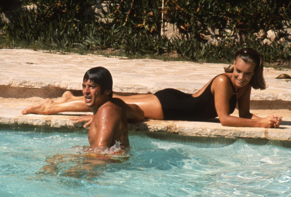 <p>Alain Delon and Romy Schneider on the set of "La Piscine". (Photo by Sunset Boulevard/Corbis via Getty Images)</p>
