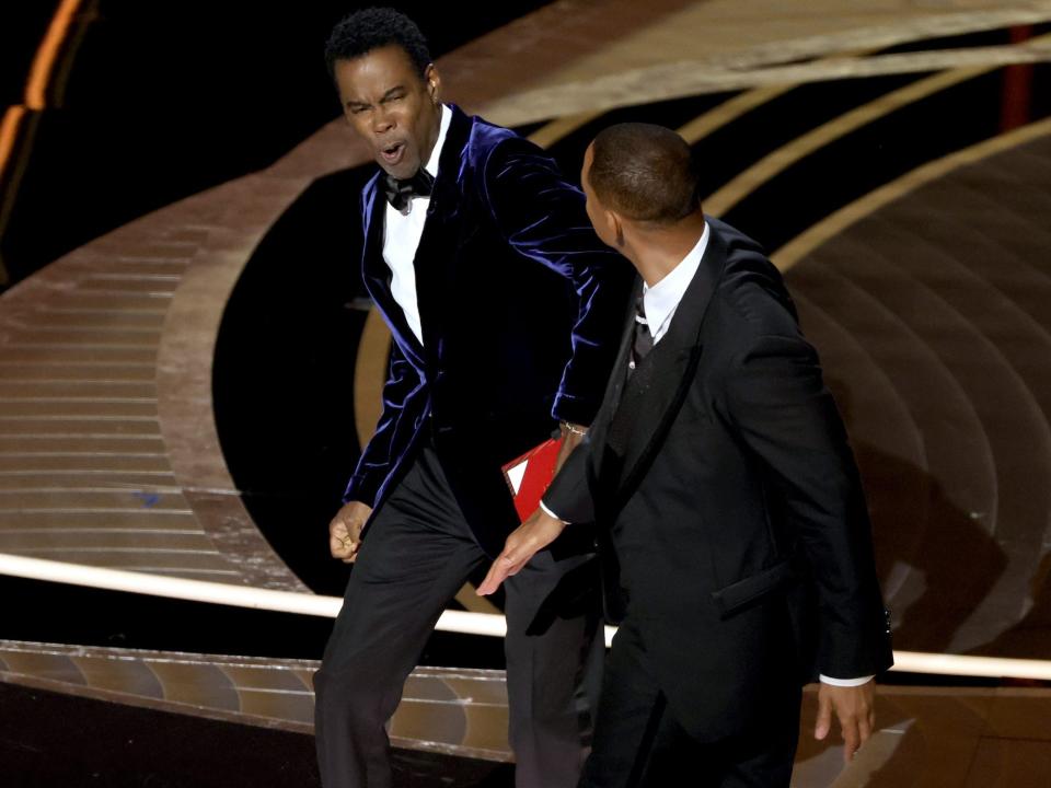 Will Smith appears to slap Chris Rock onstage during the 94th Annual Academy Awards at Dolby Theatre on March 27, 2022 in Hollywood, California.