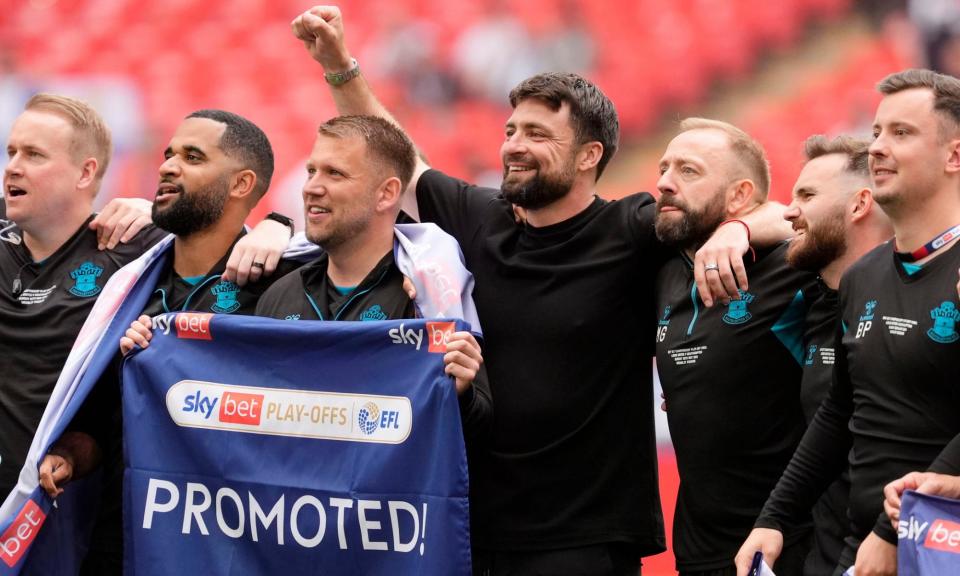 <span>Russell Martin (centre) insists Southampton will not change their style of play after promotion.</span><span>Photograph: Nick Potts/PA</span>