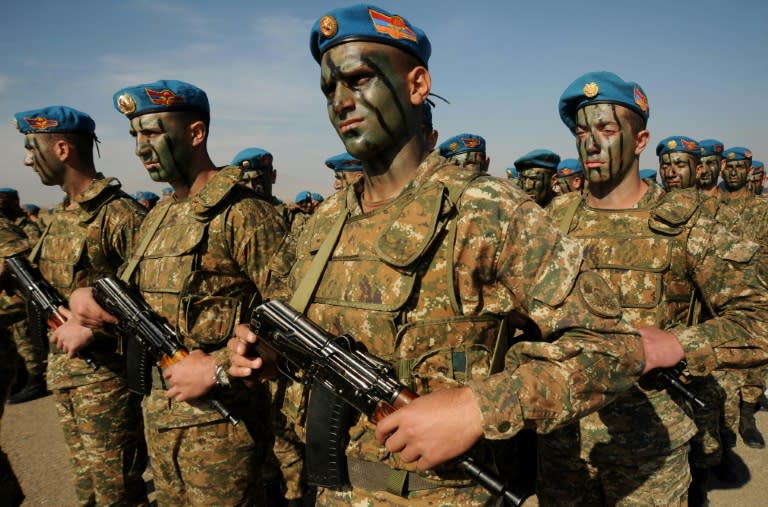 Armenian military scouts attend a performance to mark the annual anniversary of the Armenian Armed Forces reconnaissance troops formation, some 25 km outside in Yerevan on November 5, 2013