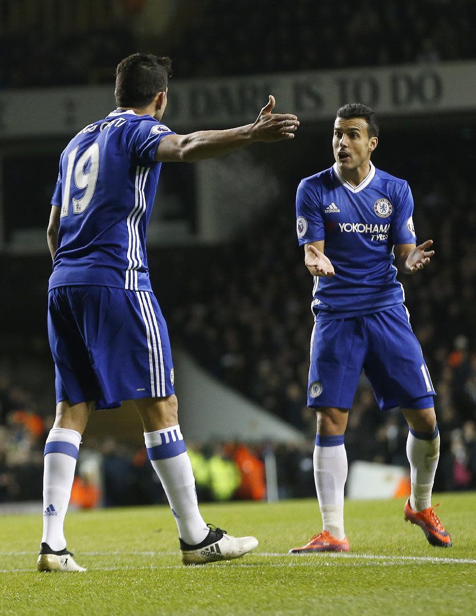 Chelsea's Diego Costa, left, and Chelsea's Pedro gesture during the English Premier League soccer match between Tottenham Hotspur and Chelsea at White Hart Lane stadium in London, Wednesday, Jan. 4, 2017. (AP Photo/Alastair Grant)