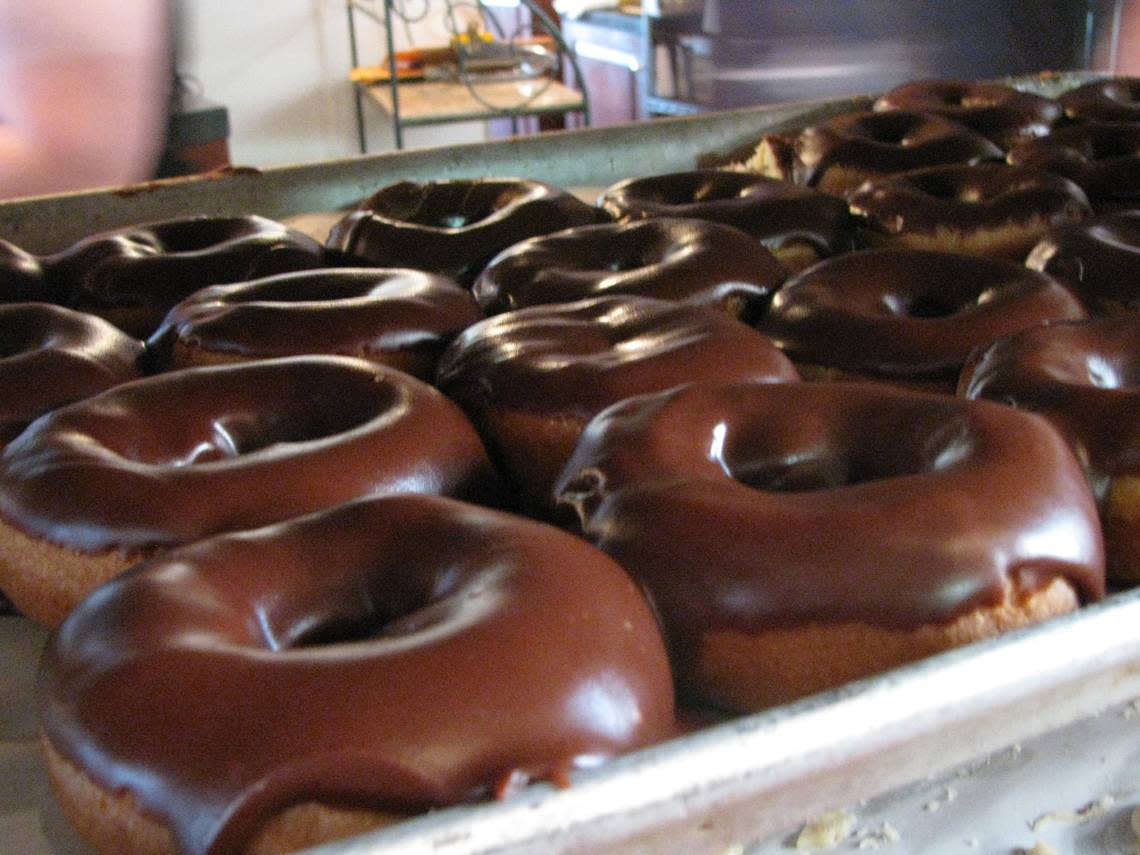 Doughnuts dripping with Magee’s homemade chocolate icing. Herald-Leader