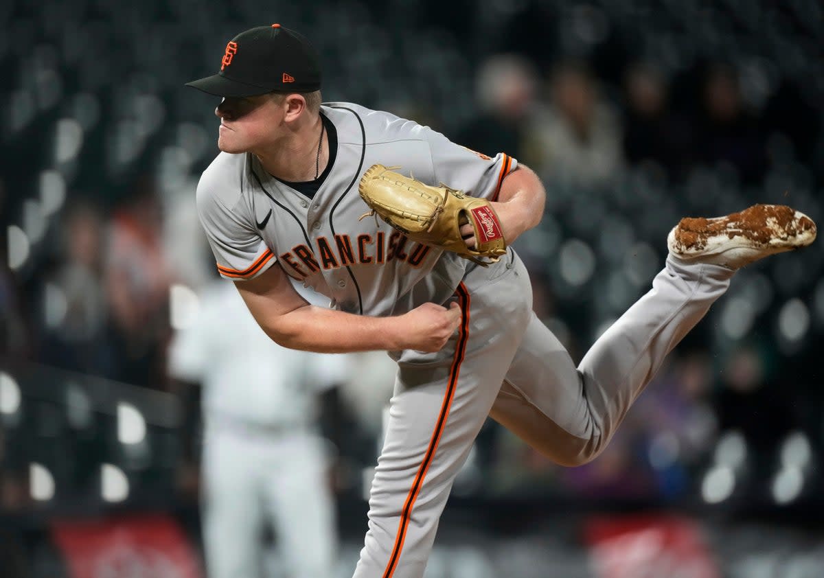 GIGANTES-ROCKIES (AP)