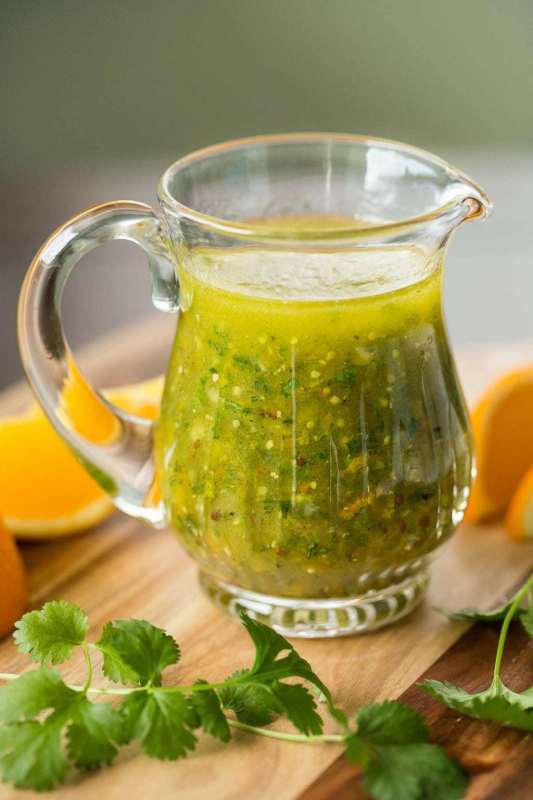 <p>This easy orange cilantro vinaigrette is bursting with a fresh flavor that will add lots of pizzazz to your salads.</p><p><strong>Get the recipe: <a href="https://thecafesucrefarine.com/orange-cilantro-vinaigrette/" rel="nofollow noopener" target="_blank" data-ylk="slk:Orange Cilantro Vinaigrette;elm:context_link;itc:0;sec:content-canvas" class="link ">Orange Cilantro Vinaigrette</a></strong></p>