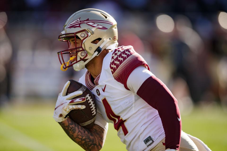 Florida State Seminoles wide receiver Mycah Pittman (4) makes his way down the field. The Florida State Seminoles hosted their annual Garnet and Gold spring game at Doak Campbell Stadium on Saturday, April 9, 2022.