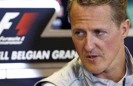 Mercedes Formula One driver Michael Schumacher of Germany addresses a news conference ahead of the weekend's Belgian F1 Grand Prix in Spa Francorchamps August 30, 2012. REUTERS/Francois Lenoir
