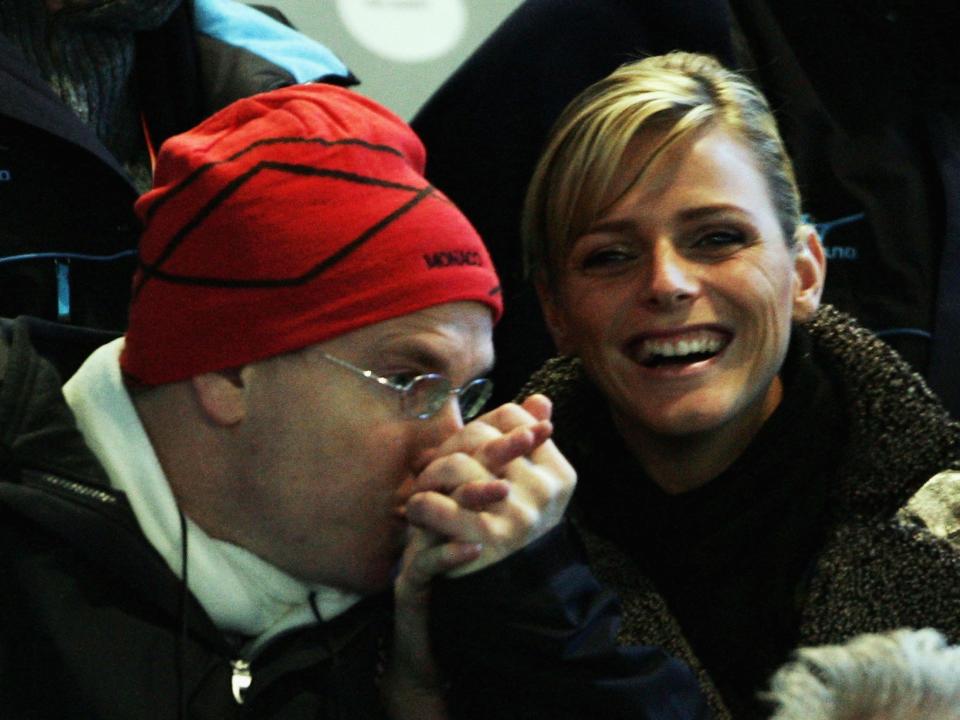 Prince Albert of Monaco and swimmer Charlene Wittstock attend the Opening Ceremony of the Turin 2006 Winter Olympic Games on February 10, 2006 at the Olympic Stadium in Turin, Italy.